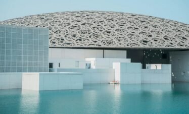 people walking on swimming pool during daytime