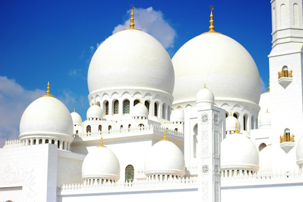 white and brown dome building under blue sky during daytime