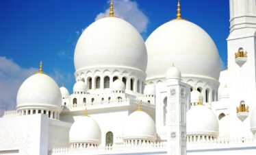 white and brown dome building under blue sky during daytime
