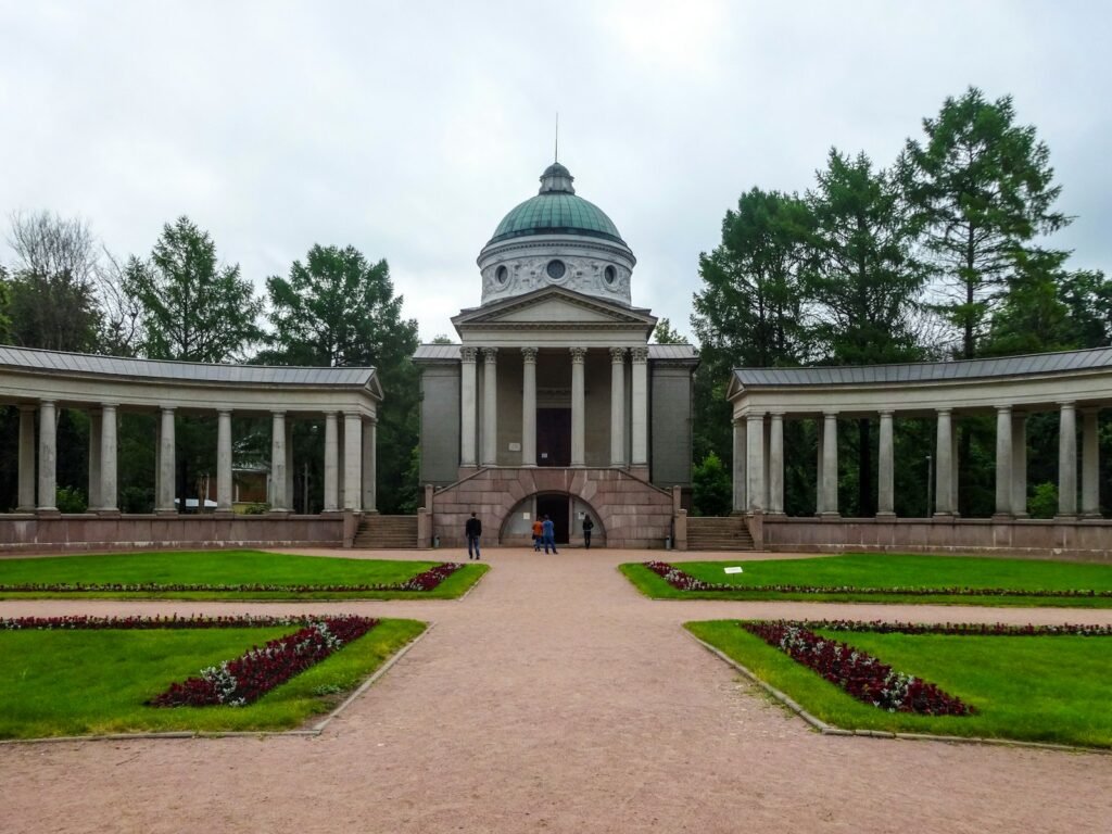 Grand classical building with colonnades in a park