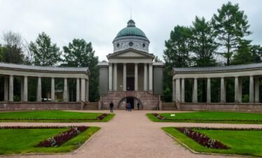 Grand classical building with colonnades in a park