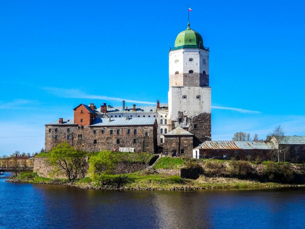 Medieval castle with green dome on a bright sunny day