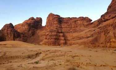 brown rock formation under blue sky during daytime
